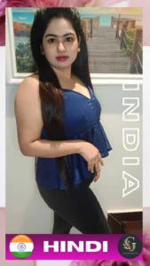 Hindi-speaking Indian woman wearing a navy blue sleeveless peplum top and black pants, posing confidently indoors with a wooden pier and sea-themed background. The text “INDIA” is vertically displayed on the image, and “HINDI” is written with an Indian flag and Asian Golden Spa logo at the bottom. She is featured as a spa therapist in Ras Al Khaimah.