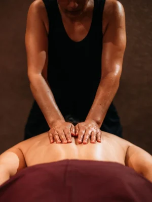 Therapist performing a professional oil back massage at Asian Golden Spa in Ras Al Khaimah